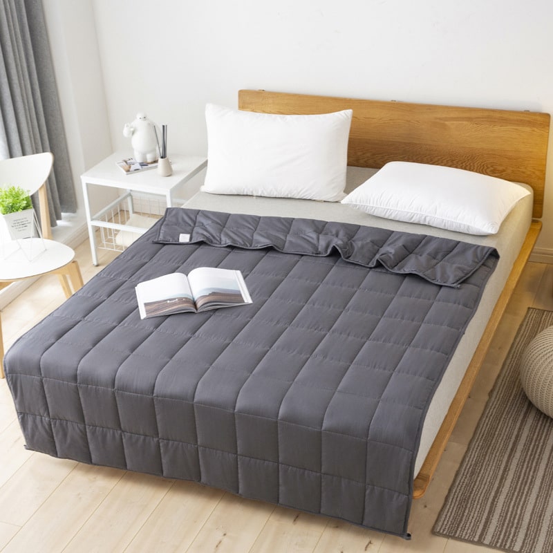 Couverture Lestée Grise: Votre Secret pour un Sommeil Profond et Réparateur